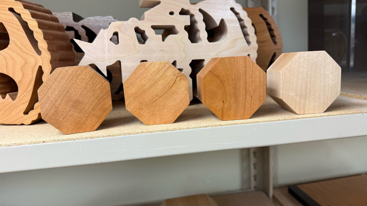 Blank rank mallet pommel examples in cherry and maple wood; sample shapes and grain may vary