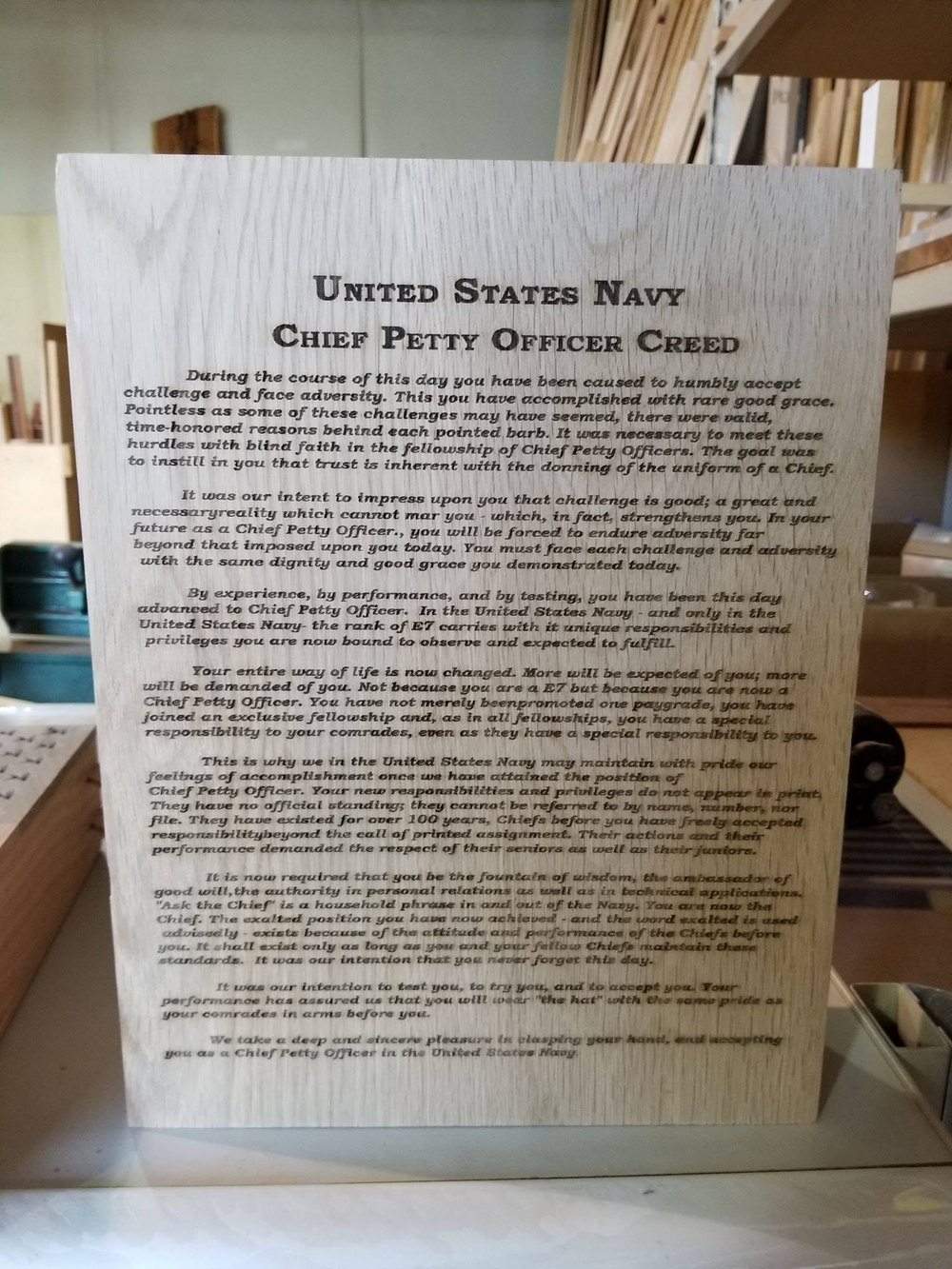 Chief Petty Officer Creed engraved on a wooden vessel panel
