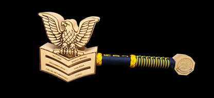 Finished custom rank mallet with engraved crow head, wrapped handle, and pommel