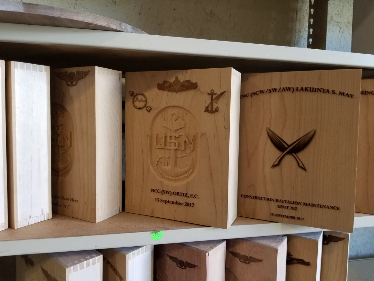 Personalized Chief Season vessels dated September 2017 on shop shelving