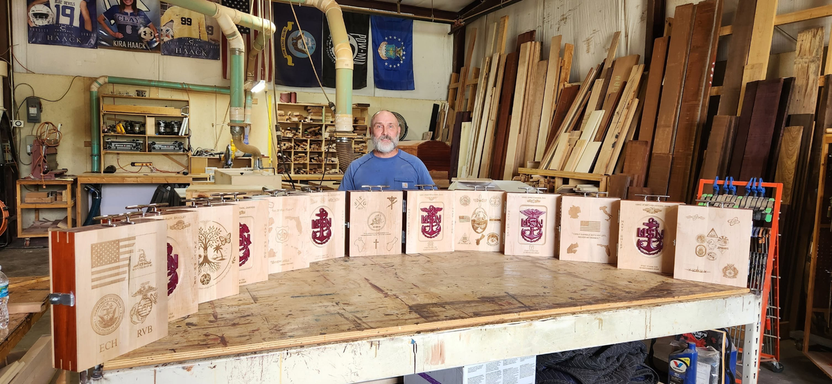 Matt in the Old Goat Custom Woods workshop with the vessels from this past Chief Season